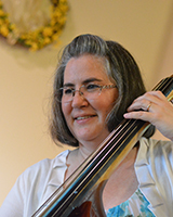 woman playing bass