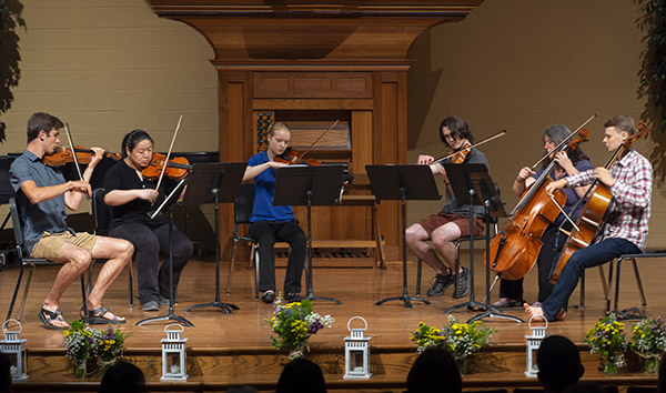 a group playing a string sextett